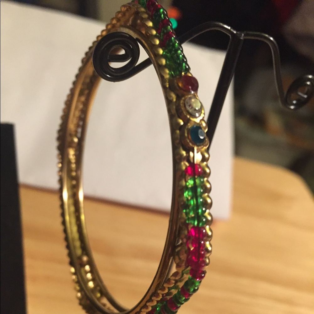 Gold bracelet w red & green gems